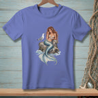Mermaid with seagull sitting on a rock, detailed illustration on a t-shirt.