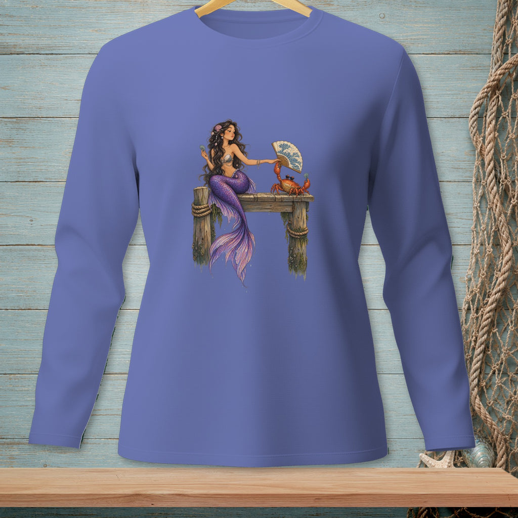 Purple long sleeve shirt with a mermaid and crab design on a wooden dock.