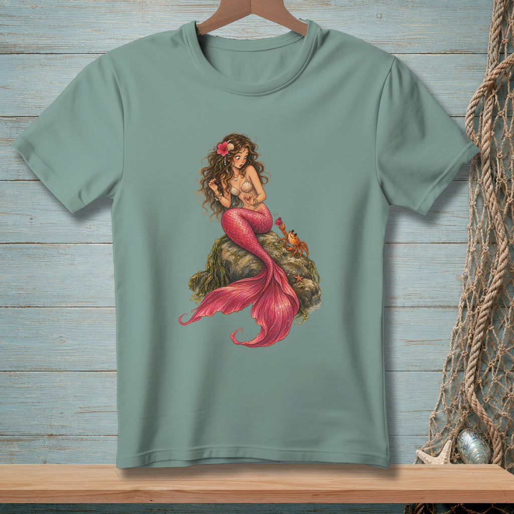 Mermaid with pink tail sitting on a rock with a crab.