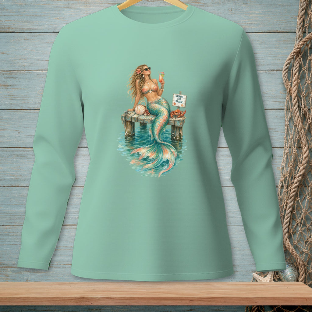Mermaid with drink on dock, text "SHARE THE SPACE", and crab.