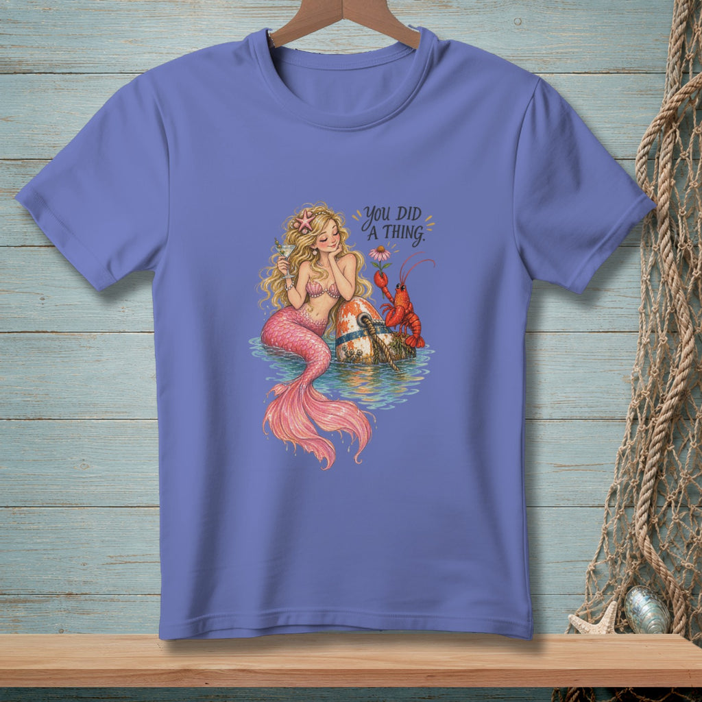 Illustration of a mermaid with a lobster and text that reads "YOU DID A THING."