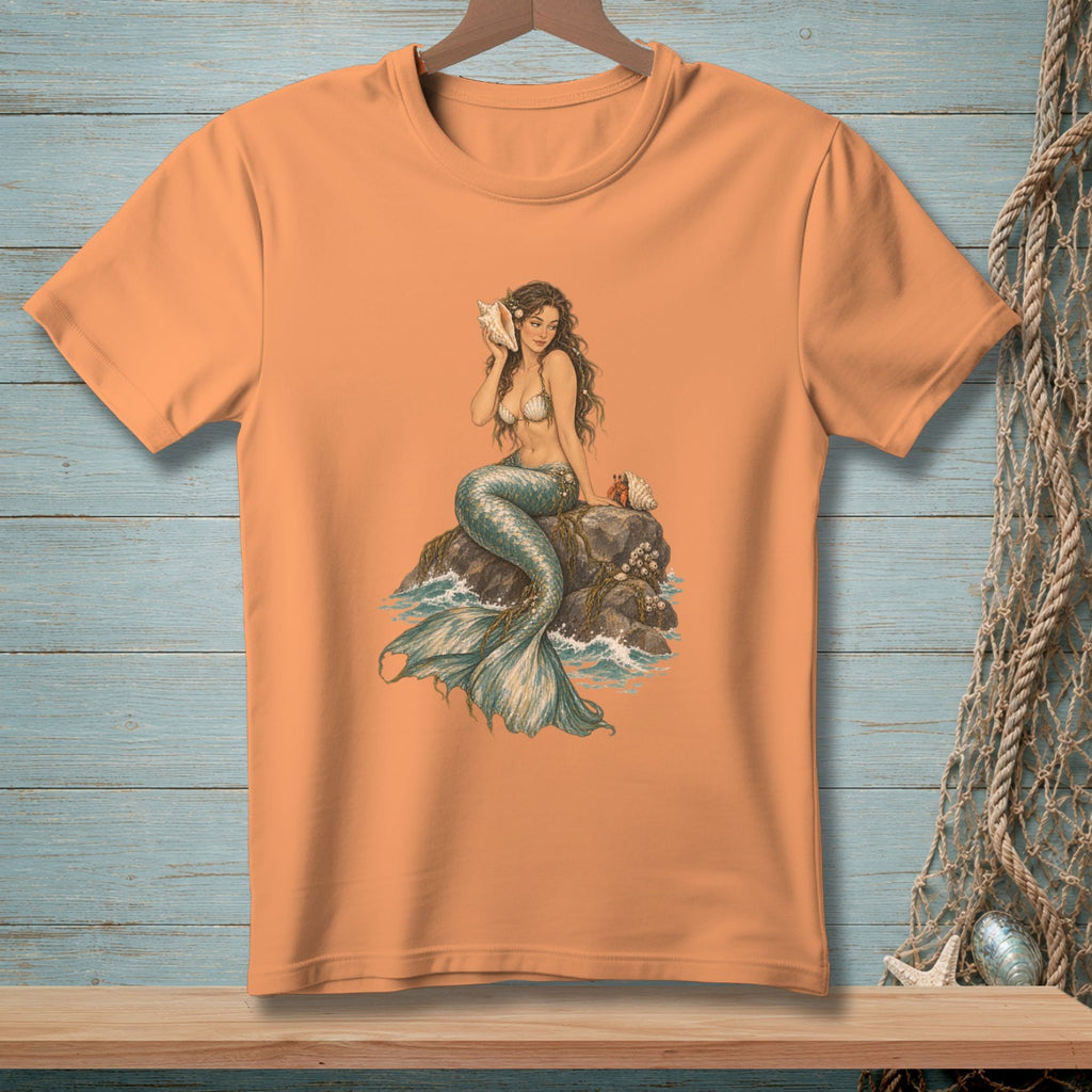 Illustration of a mermaid sitting on a rock holding a seashell, with a hermit crab nearby.