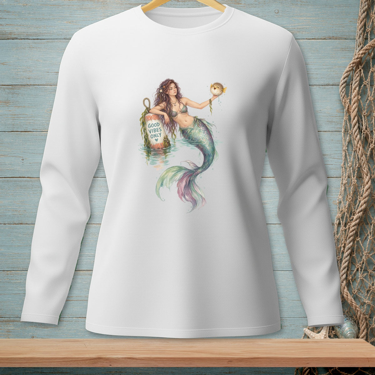 Mermaid with pufferfish and buoy reading "Good Vibes Only".