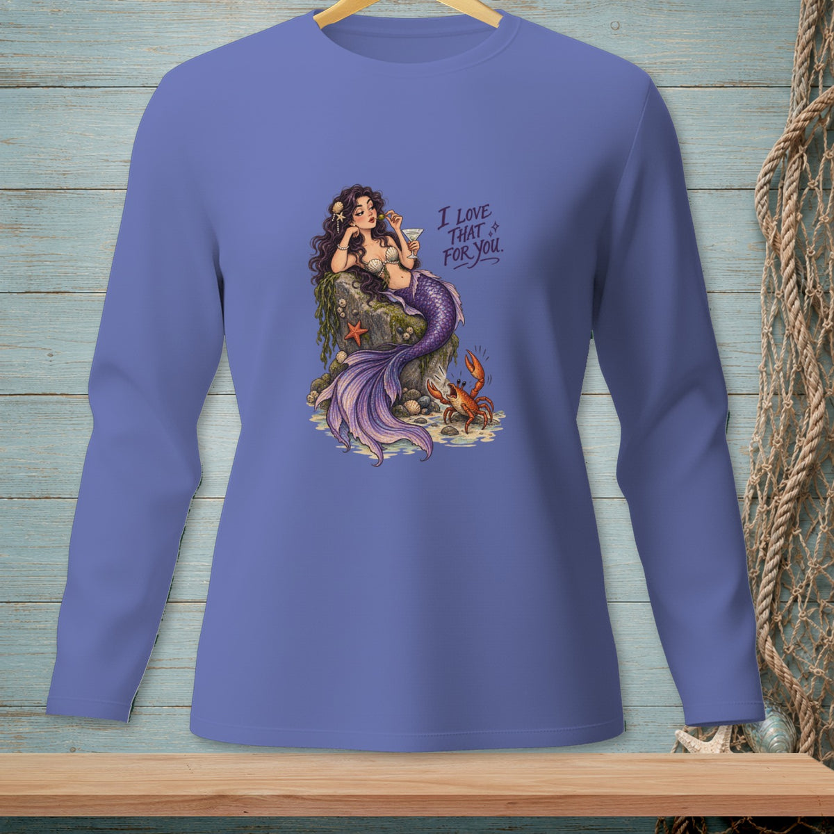 Mermaid sitting on a rock with a drink and a crab, text "I LOVE THAT FOR YOU".