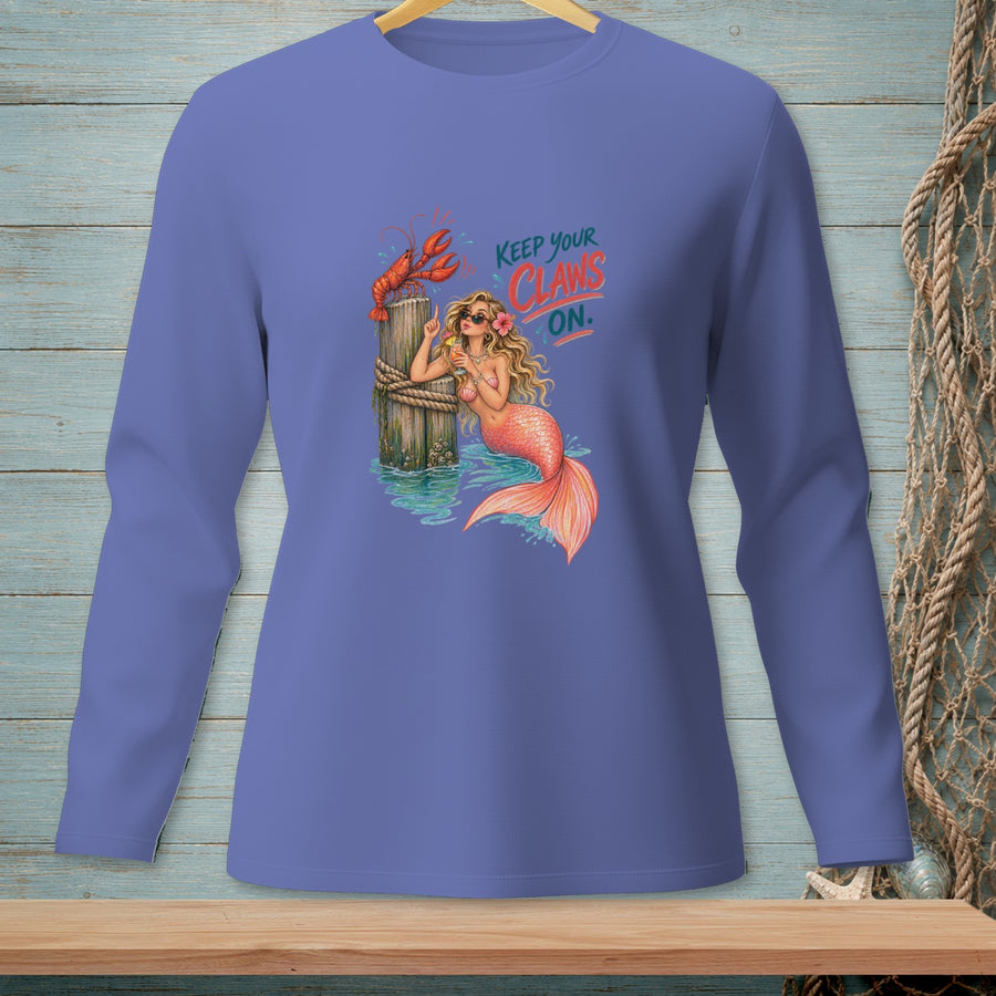 Mermaid with lobster and text "KEEP YOUR CLAWS ON." on purple shirt.