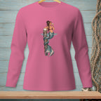Pink long-sleeve shirt with a graphic of a mermaid holding a drink next to a dock post.