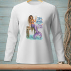 Mermaid with champagne on a dock with text "Sea Hair Zero Care."