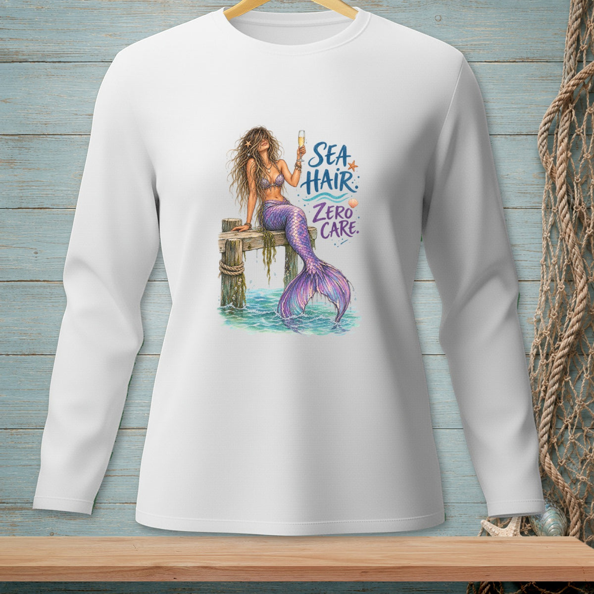 Mermaid with champagne on a dock with text "Sea Hair Zero Care."