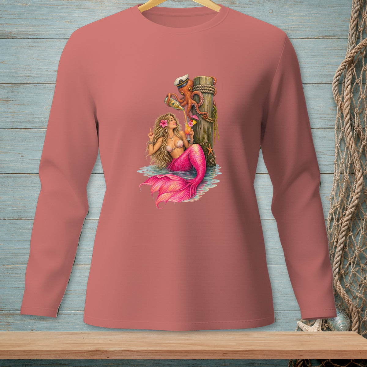 Mermaid with pink tail, octopus pouring drinks, and starfish by a wooden post.