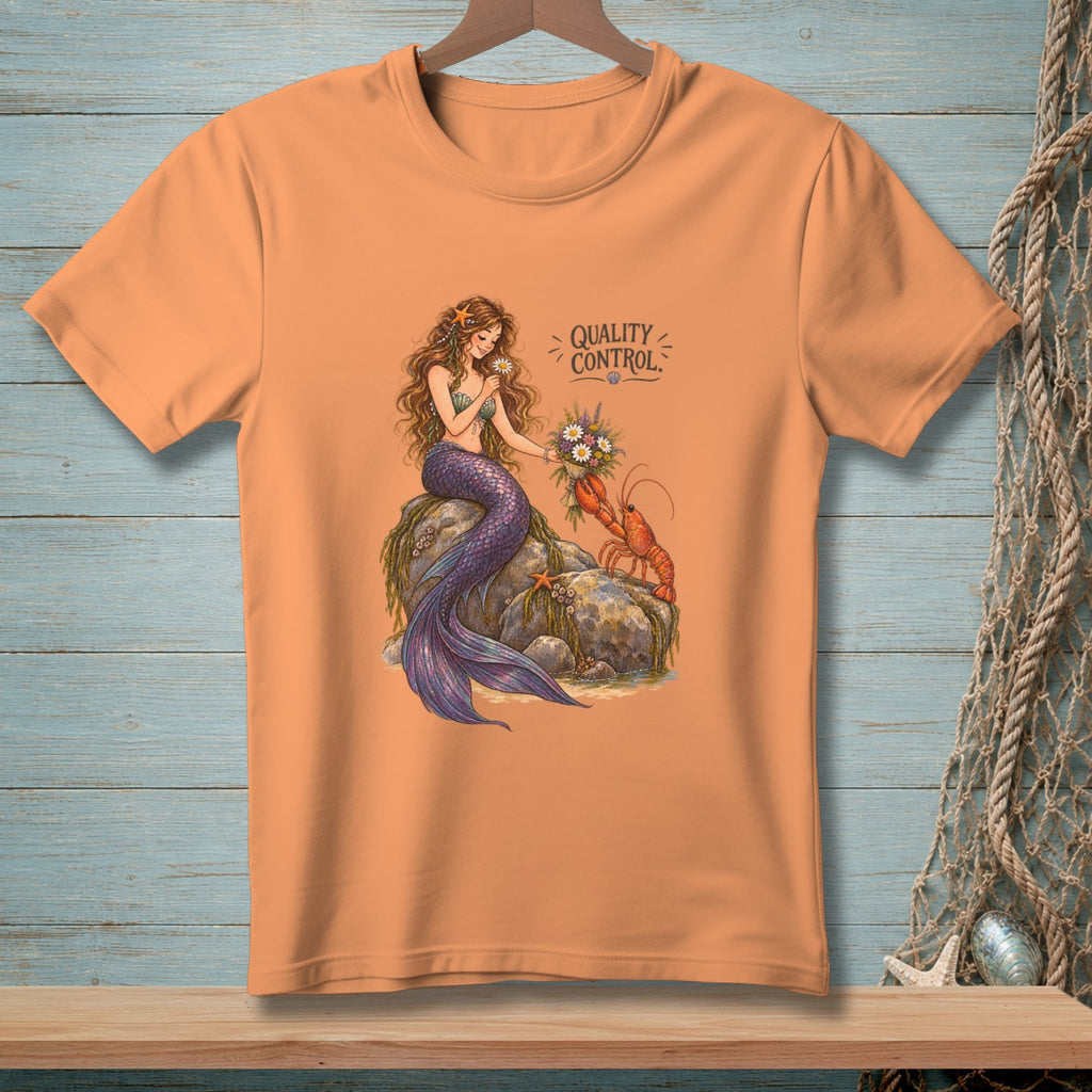 Mermaid with lobster and bouquet reads "QUALITY CONTROL" on peach t-shirt.