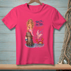 Pink t-shirt with a mermaid, crab, and text "Talk to the tail, crab take".