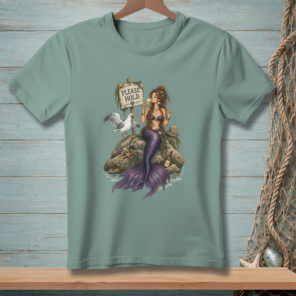 Mermaid holding wine and gesturing near a seagull by a "Please Hold" sign.
