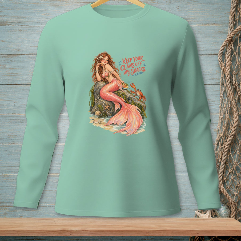 Mermaid with pink tail on rocks with crabs and text "Keep Your Claws Off My Snacks".
