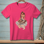 Pink t-shirt featuring a mermaid with a drink sitting on a rock.
