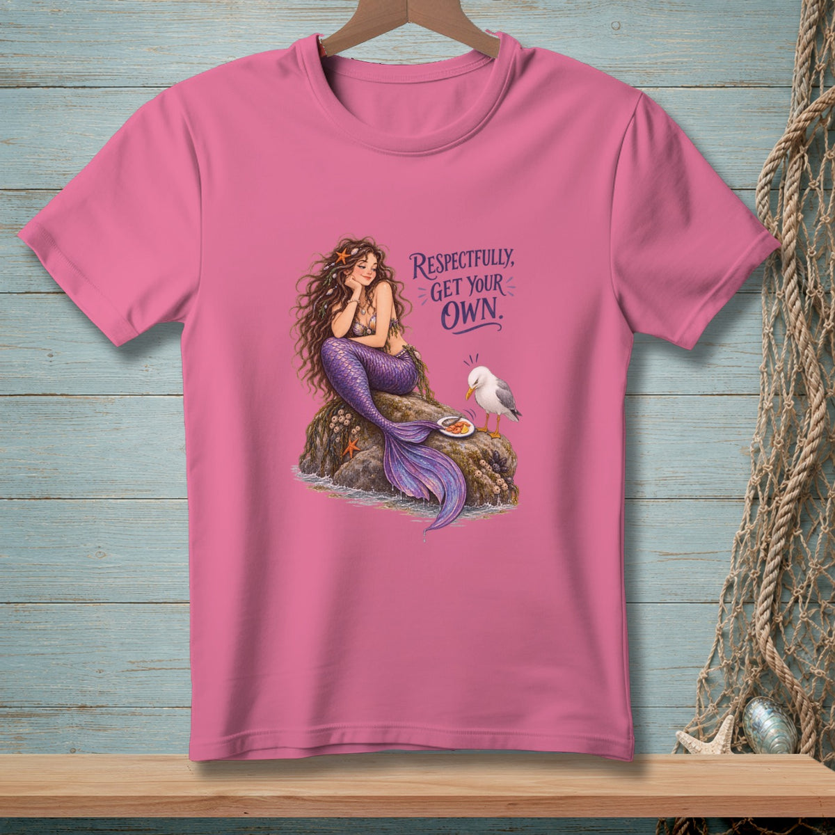 Pink t-shirt with a mermaid and seagull graphic, reading "Respectfully, Get Your Own."