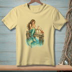 Mermaid reading a letter on a dock with a crab and cocktail.
