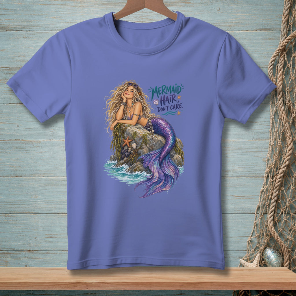 Mermaid on rock with text "Mermaid Hair, Don't Care"