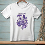 White t-shirt with "I have a tail and an attitude" text and mermaid tail graphic.