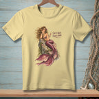 Pale yellow t-shirt with mermaid graphic and text "Salty Hair. Fancy Drink."