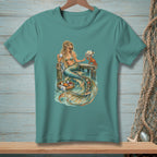 Mermaid on a pier reading, holding coffee with a crab nearby.