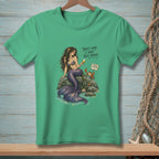Green t-shirt with mermaid, crab, and text "That's why I have nice things."