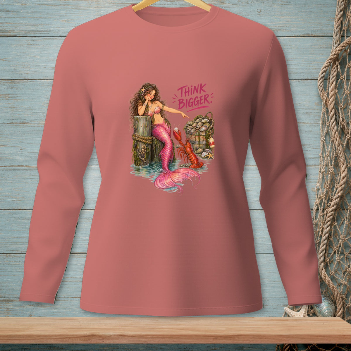 Long-sleeve shirt with mermaid, lobster, and oysters, text "THINK BIGGER".