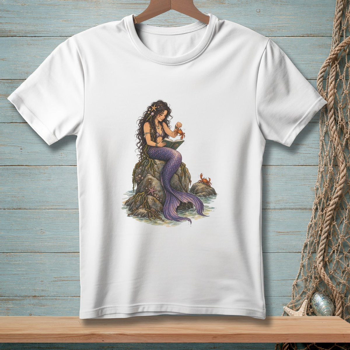 Mermaid reading a book to a crab on a rock.