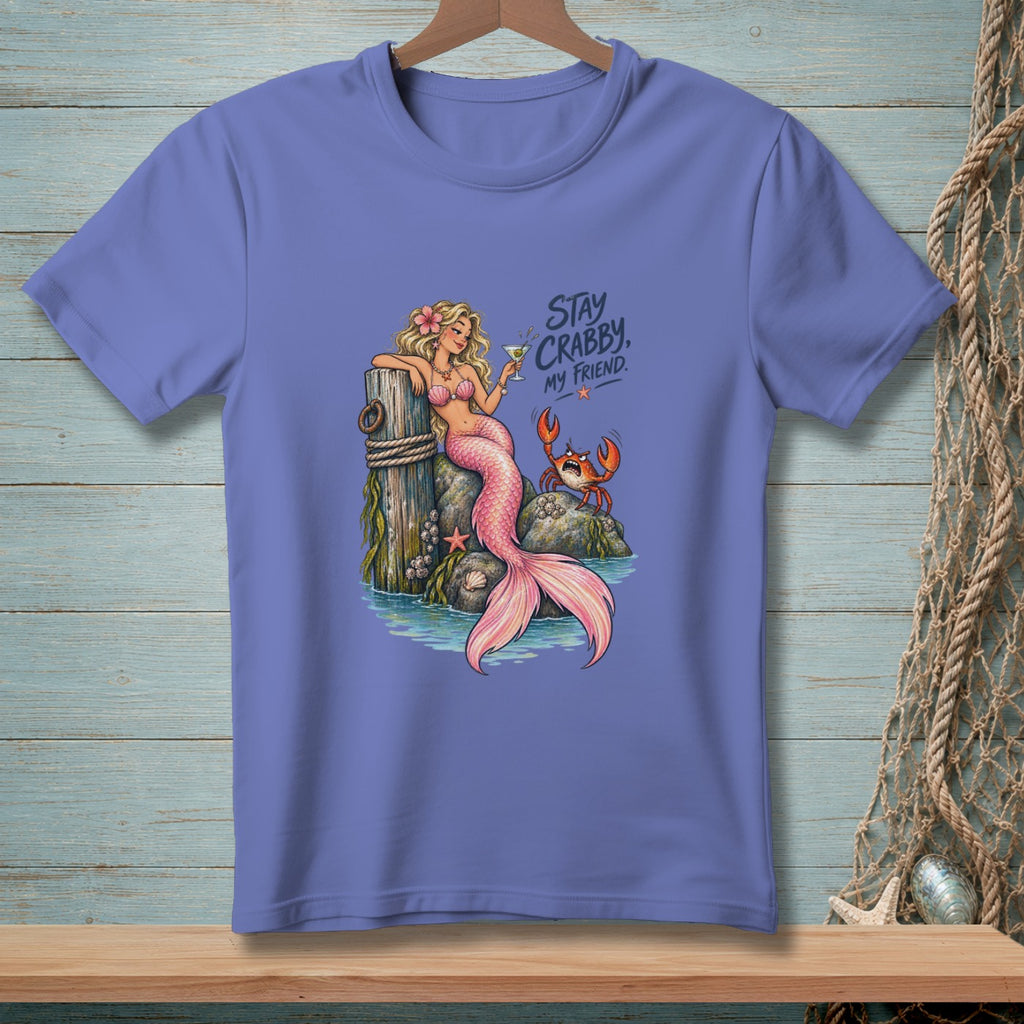 Mermaid with a drink and a crab sit on rocks, with "Stay Crabby, My Friend" text.