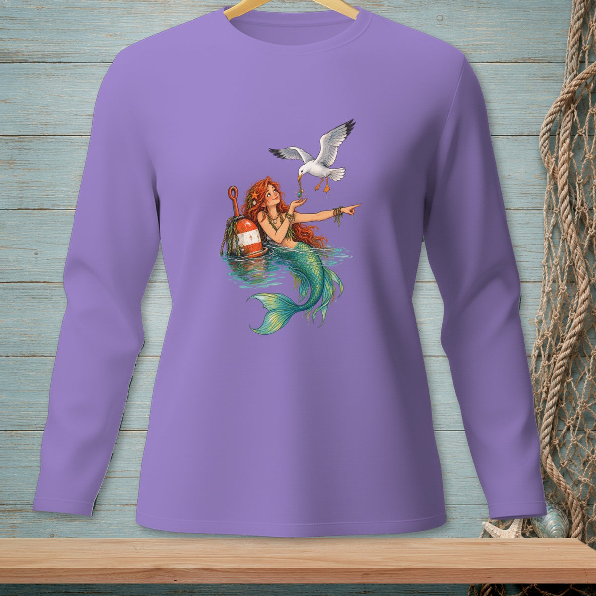 Purple long-sleeve shirt with a mermaid and seagull graphic.