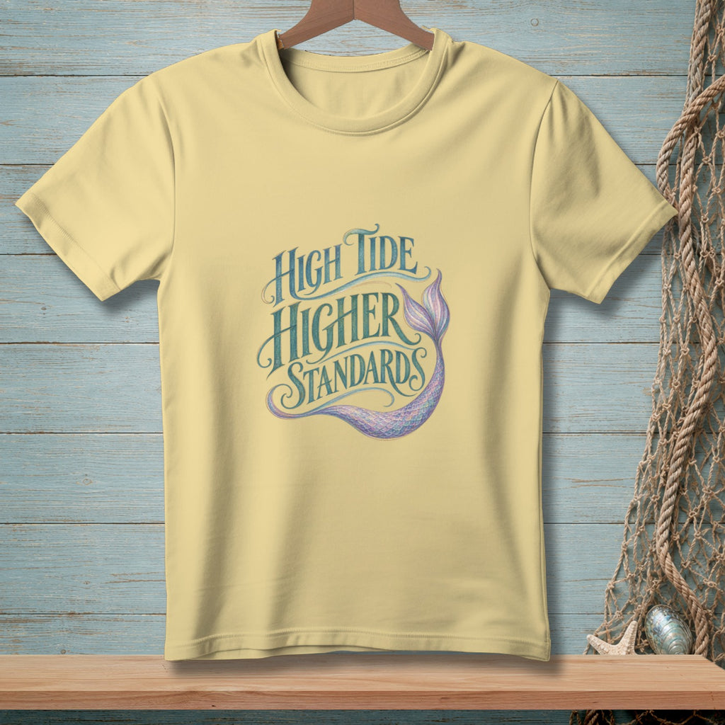 Light yellow t-shirt with "High Tide Higher Standards" text and mermaid tail graphic.