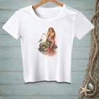 White t-shirt featuring a mermaid feeding a seagull on a rock.