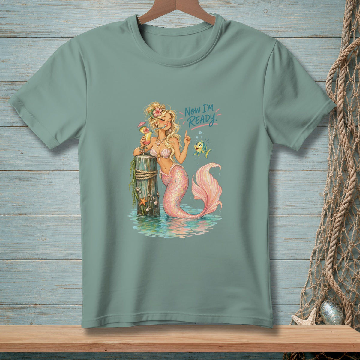 Mermaid with drink and fish, saying "Now I'm Ready."