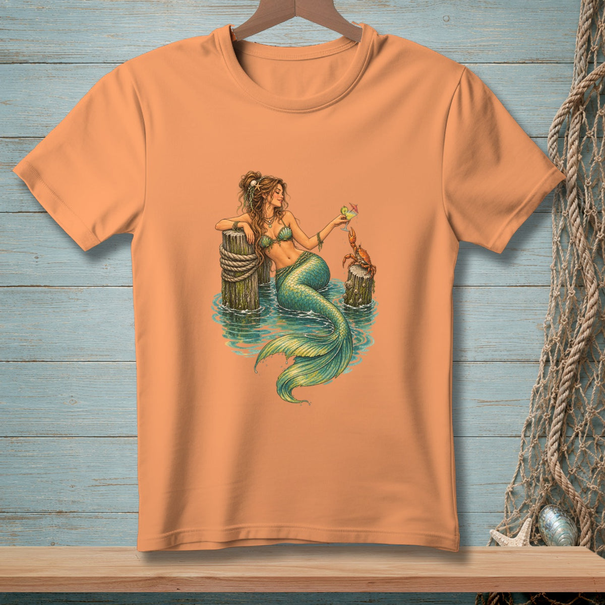 Mermaid with green tail and bikini sits on post, drinks cocktail with crab nearby.