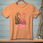 Orange t-shirt with a pink mermaid, octopus, and "NO NOTES." text graphic.