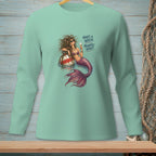 Mint green long-sleeve shirt with mermaid graphic and text "HAIR'S A WRECK. PRIORITIES INTACT."