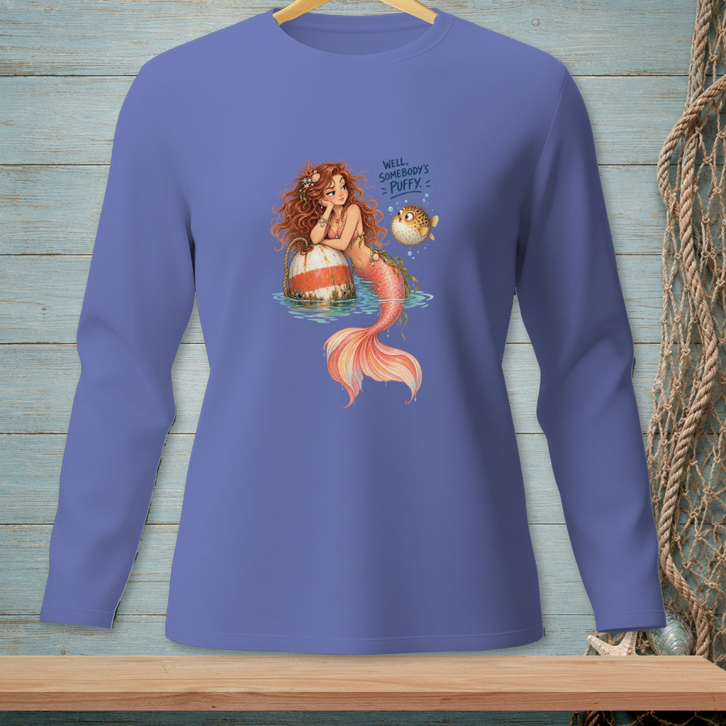 Mermaid with pufferfish on purple long-sleeve shirt, text reads "Well, Somebody's Puffy."