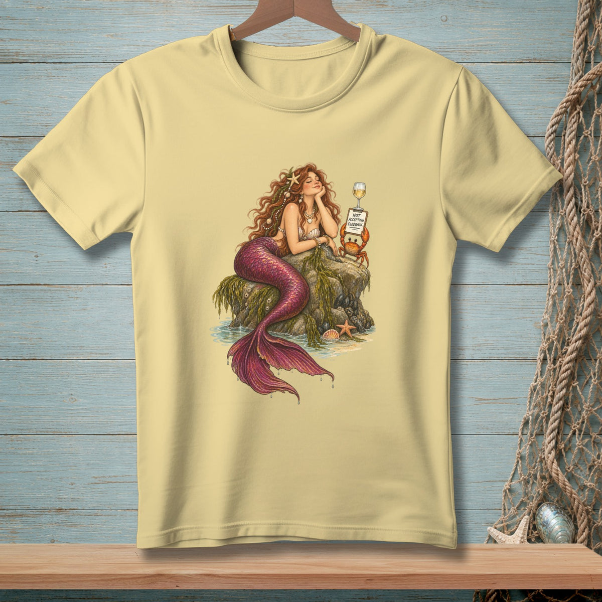 Mermaid with wine and crab reading "NOT ACCEPTING FEEDBACK" sign.