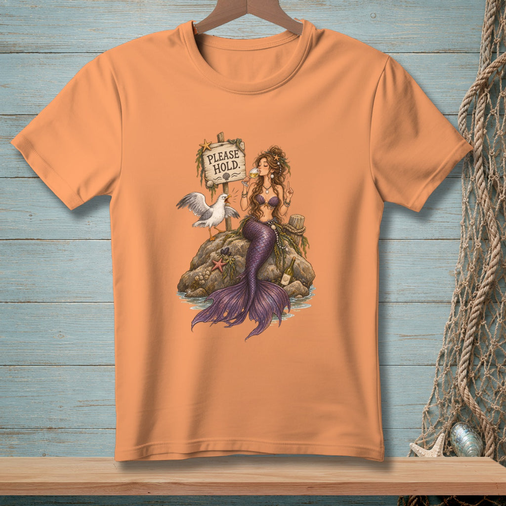 T-shirt graphic of a mermaid and seagull with a "Please Hold" sign.