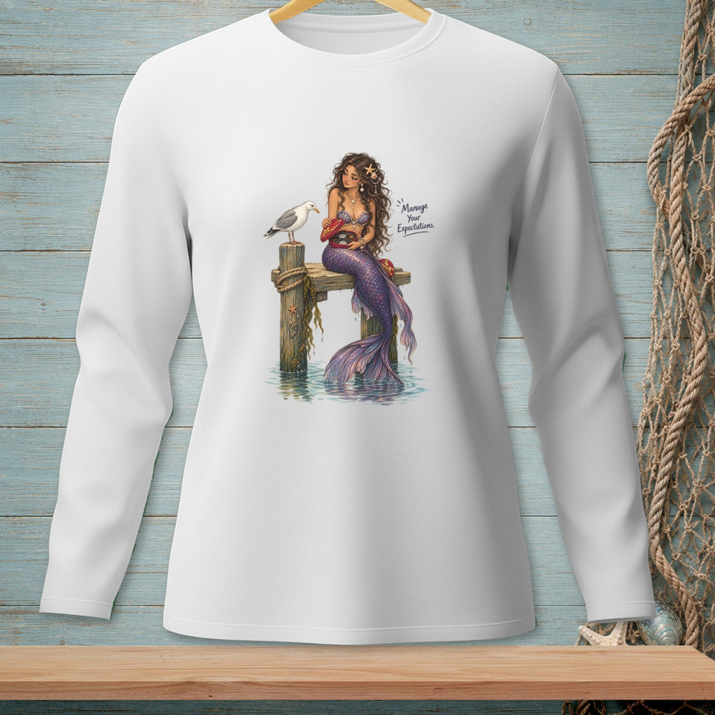 Mermaid on pier with seagull and crab, text "Manage Your Expectations."