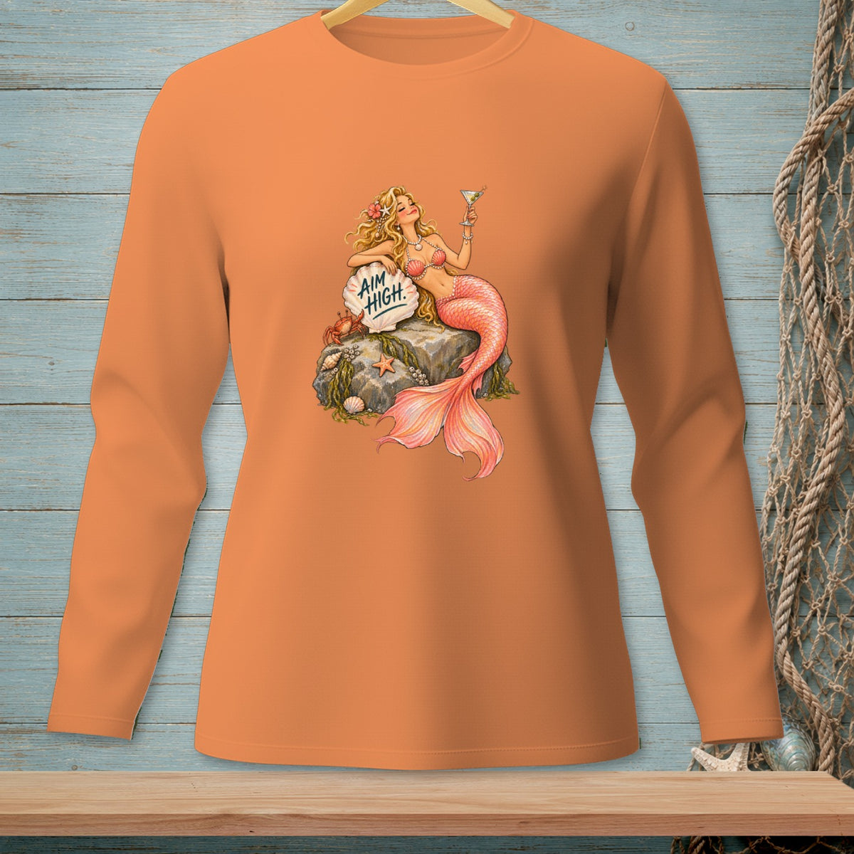 Mermaid holding cocktail on rock with text "AIM HIGH"