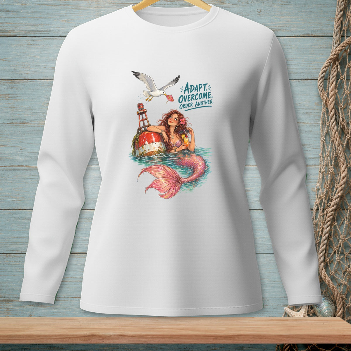 Long sleeve white shirt with mermaid, buoy, seagull and text "ADAPT. OVERCOME. ORDER ANOTHER."