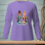 Two mermaids sitting on a dock, talking over drinks, with fishnets in background.