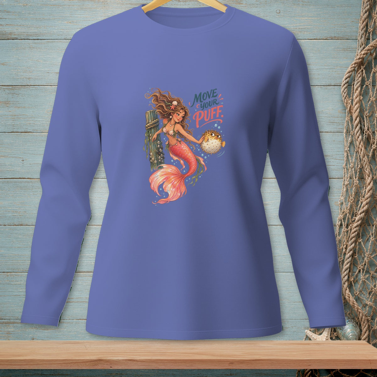 Long sleeve shirt with mermaid and pufferfish graphic, reads "Move Your Puff."
