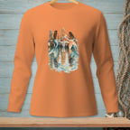 Three mermaids sit on a dock having a picnic with reflections in the water.