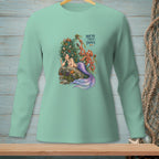 Mermaid with octopus and text "NOT MY FIRST JANGLE" on a light green long-sleeve shirt.