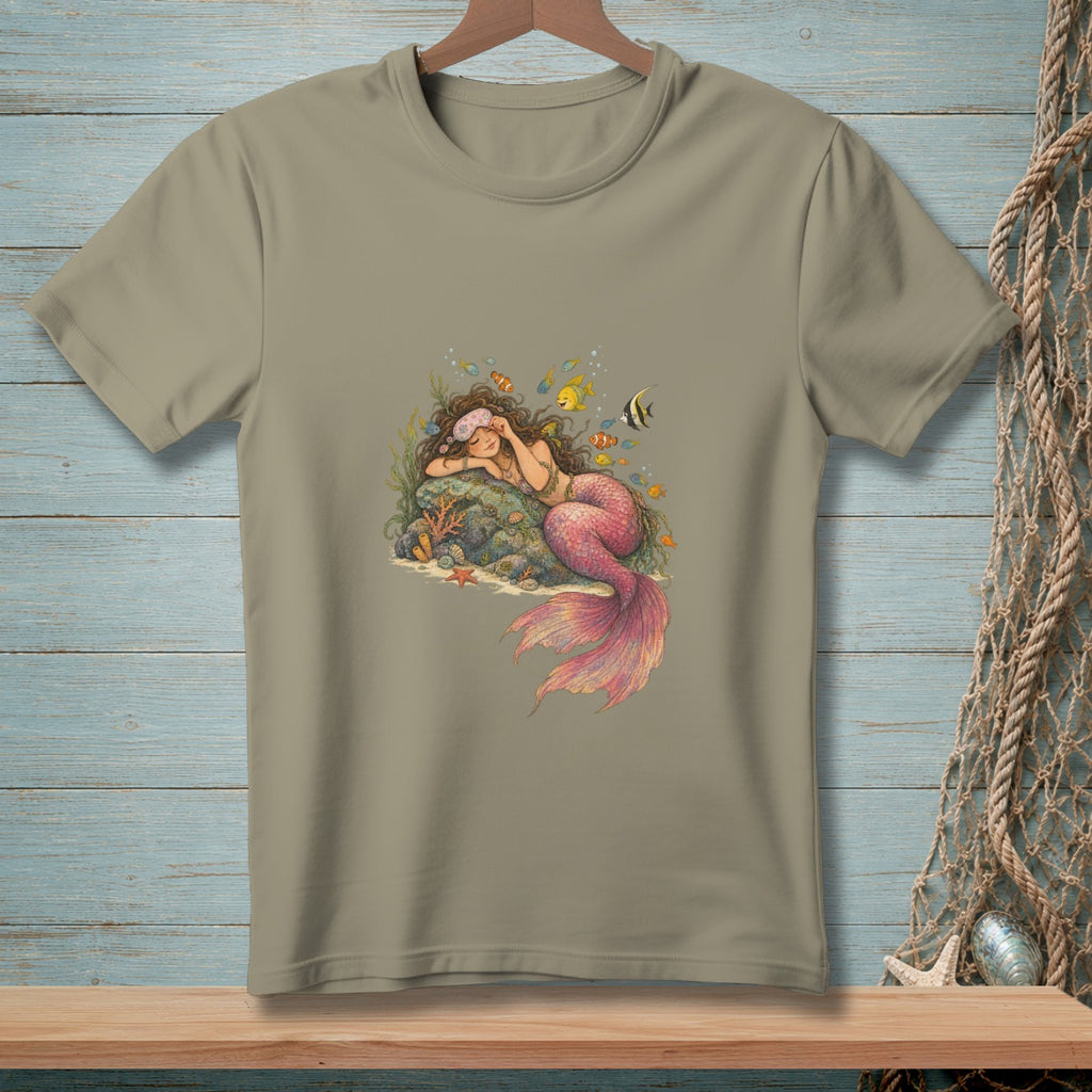 T-shirt with illustration of a sleeping mermaid with pink tail and colorful fish.