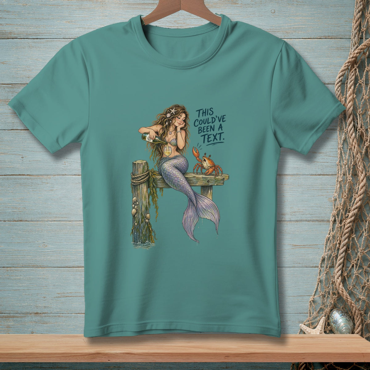 Mermaid pours wine for a crab with text "THIS COULD'VE BEEN A TEXT."