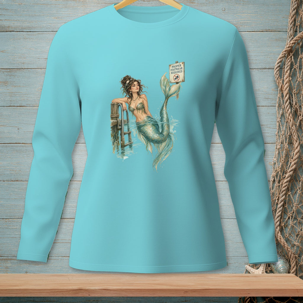 Long sleeve teal t-shirt with mermaid graphic and "Proper Footwear Required" sign.