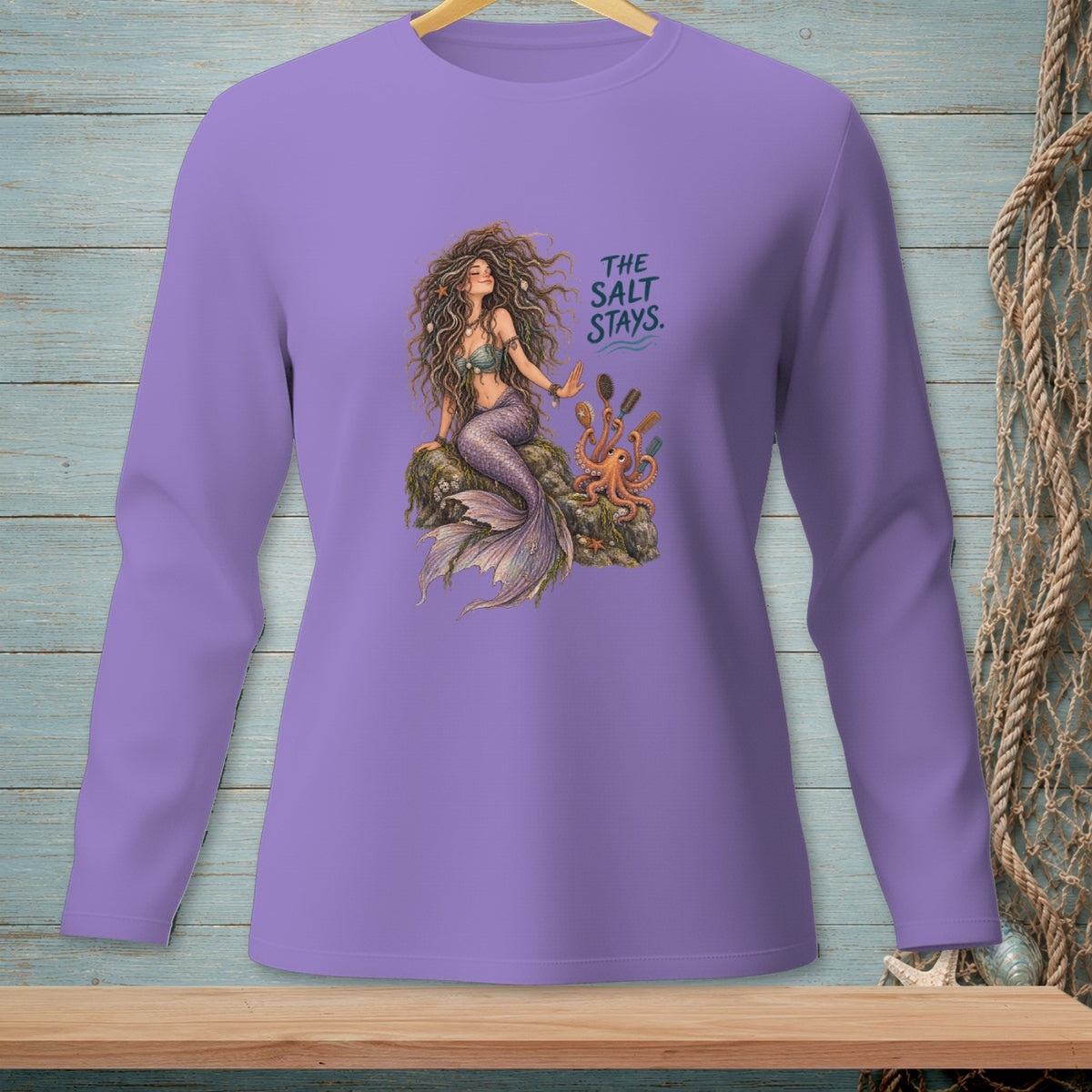 Purple long sleeve shirt with mermaid and octopus graphic. "The Salt Stays."