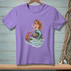 Purple t-shirt with a mermaid, lobster, and pearls on rocks in waves.